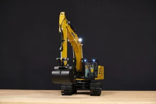 Радиоуправляемый экскаватор с гидравлической системой HUI NA TOYS 2.4G 22CH 1/16 RTR HNK336GC — фото 6